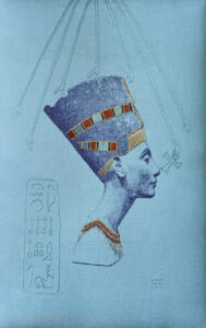 Head of Nefertiti Photograph of the embroidered Head of Nefertiti, which is on a turquoise fabric, screenprinted with a navy blue shaded representation of the famous bust. Elements of the design are highlighted using silk and gold threads.